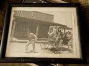 George White's father, who was sheriff of Pioneertown, Calif., pretends to pull a buggy.