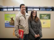 Alyssa and David Paulson of Vancouver visit a Twinstar Credit Union branch where they opened a business account Saturday.