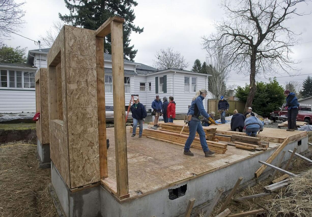 A house going up at West 39th Street and Lincoln Avenue is the first Habitat for Humanity project in the Lincoln neighborhood.