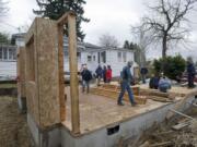 A house going up at West 39th Street and Lincoln Avenue is the first Habitat for Humanity project in the Lincoln neighborhood.