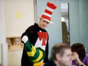 Ryan Colgrove plays the Cat in the Hat at Hough Elementary's annual green eggs and ham breakfast.