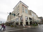 People cross West Sixth Street in front of the Hilton Vancouver Washington this week. City officials estimate that about $350,000 of lodging tax reserves will be needed to make a $2.4 million debt payment due on Jan. 1.