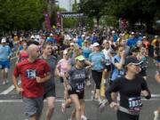 The inaugural Vancouver USA Marathon gets under way Sunday morning on Columbia Street adjacent to Esther Short Park in downtown Vancouver.