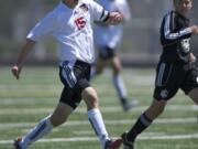 Camas' Adam Allison moves the ball up field against Bonney Lake in the second half at Doc Harris Stadium on Saturday.