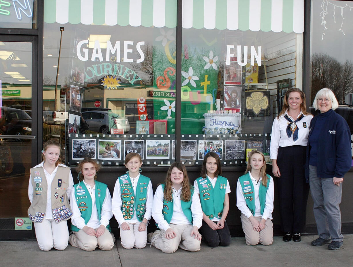 Fircrest: From left, Madison Snyder, Mikayla Munger, Darby Snyder, Aurora Lauser, Brooke Baldwin, Taryn Lake, Scout leader Chris Snyder and Kazoodles co-owner Mary Sisson.