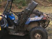 Woodland police are asking for the public's help in a case of a stolen ATV and trailer.