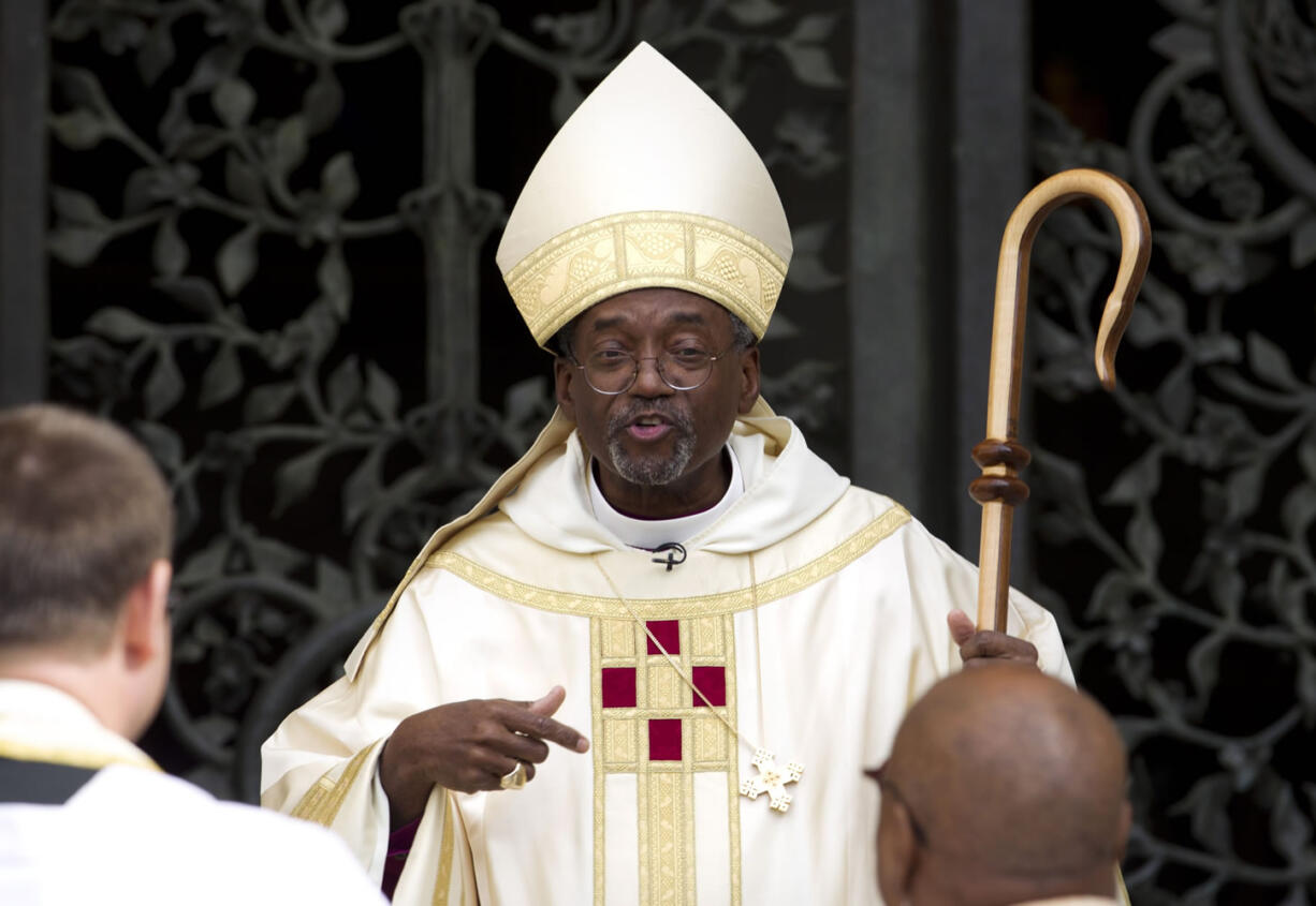 Episcopal Church Presiding Bishop-elect Michael Curry speaks to churchgoers Nov. 1 as he arrives at the Washington National Cathedral in Washington. Curry said Friday the U.S. Episcopal Church will not roll back its acceptance of gay marriage despite sanctions imposed this week by Anglican leaders.