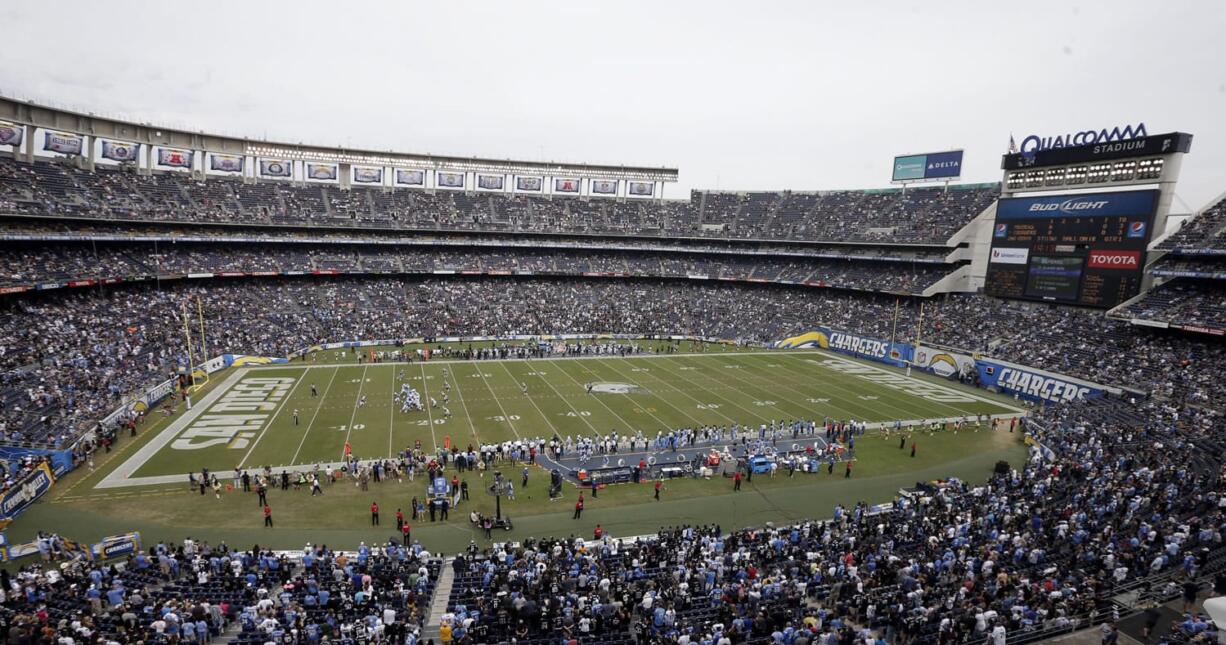 The San Diego Chargers play the Oakland Raiders during an NFL football game at Qualcomm Stadium in San Diego. Chargers Chairman Dean Spanos said Friday, Jan. 29, that the team will play in San Diego in 2016, and he&#039;ll work with politicians and the business community to try to resolve a long, bitter fight over a new stadium.