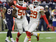 Kansas City Chiefs free safety Eric Berry (29) celebrates his interception against the Houston Texans during the first half of an NFL wild-card football game Saturday, Jan. 9, 2016, in Houston.