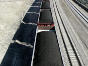 A train loaded with coal travels through northeast Wyoming near Gillette in August 2006.