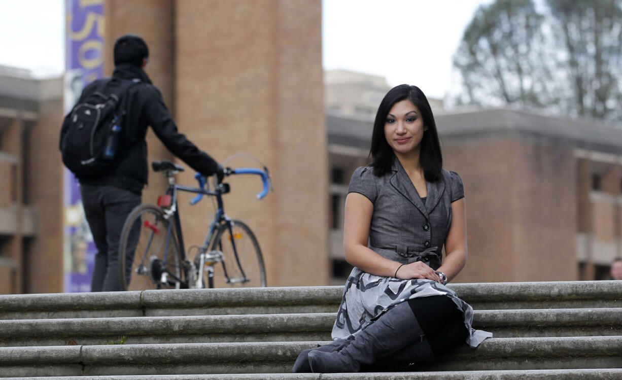 Kristina Ponischil sits Jan. 12 on the campus of the University of Washington in Seattle, where she works as a researcher.