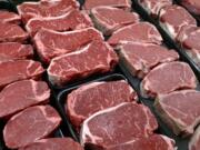 Steaks and other beef products are displayed for sale at a grocery store in McLean, Va. Americans may not have to cut back on eggs and salt as much as they once thought. And eating lean meat is still OK. But watch the added sugars -- especially the sugary drinks. The Obama administration&#039;s new dietary guidelines, released Jan. 7, back off the strictest sodium rules included in the last version, while still complaining that Americans consume too much salt. (J.