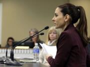 In this photo taken Jan. 20, 2016, Kerri Kasem, right, the daughter of the late radio personality Casey Kasem, waits to testify during a hearing at the Capitol in Olympia, Wash. Kasem and others are seeking easier ways for family and friends to visit ailing elders, after she was blocked from seeing her father, who died at 82 in Gig Harbor, Wash., in 2014 due to a long legal battle over his care between his three adult children from a previous marriage and Jean Kasem, his second wife. (AP Photo/Ted S. Warren) (Photos by Ted S.