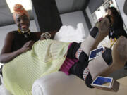 Marian Kihogo, a fashion stylist and blogger from London, shows off a pair of her shoes Tuesday during Fashion Week in New York.