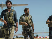 Pablo Schreiber, from left, John Krasinski, David Denman and Dominic Fumusa star in &quot;13 Hours: The Secret Soldiers of Benghazi.&quot; (Christian Black/Paramount Pictures)