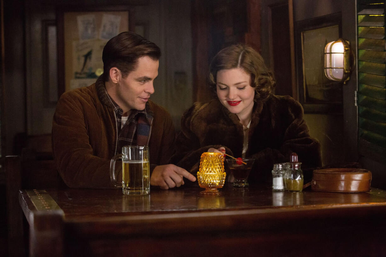 Chris Pine, left, and Holliday Grainger appear in a scene from &quot;The Finest Hours.&quot; (Claire Folger/Disney)