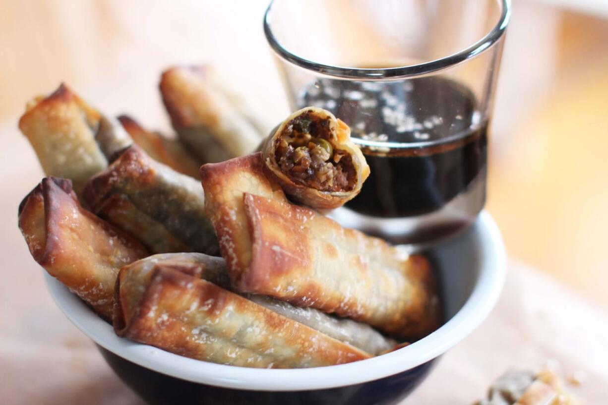 Baked Egg Rolls with sesame-soy dipping sauce.