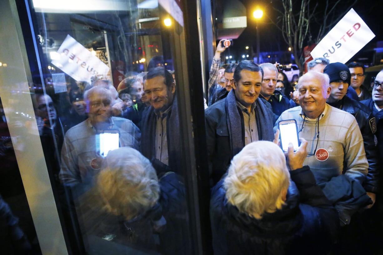 Republican presidential candidate Sen. Ted Cruz, R-Texas, poses for a photograph during a campaign stop Sunday, Jan. 17, 2016, in Milford, N.H.