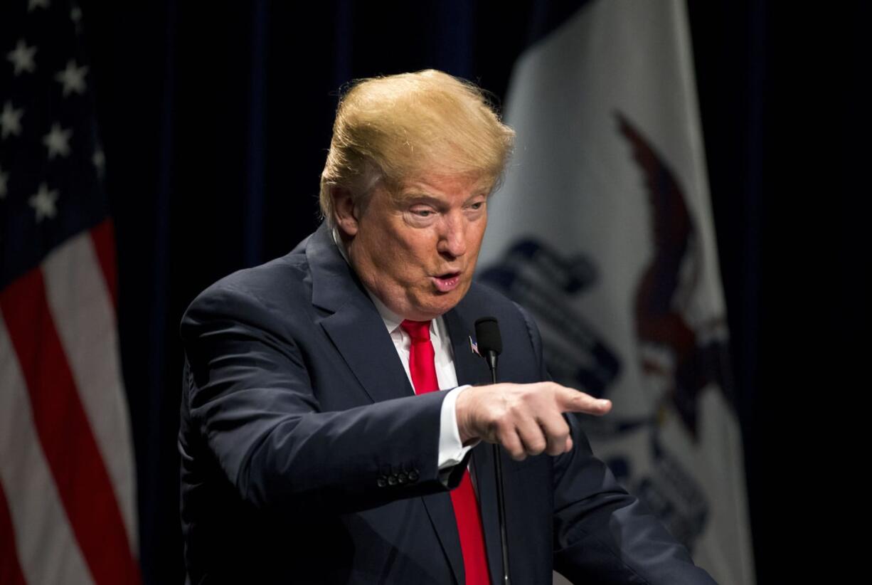 Republican presidential candidate Donald Trump addresses supporters at a rally, Saturday, Jan. 9, 2016, in Ottumwa, Iowa. (AP Photo/Jae C.