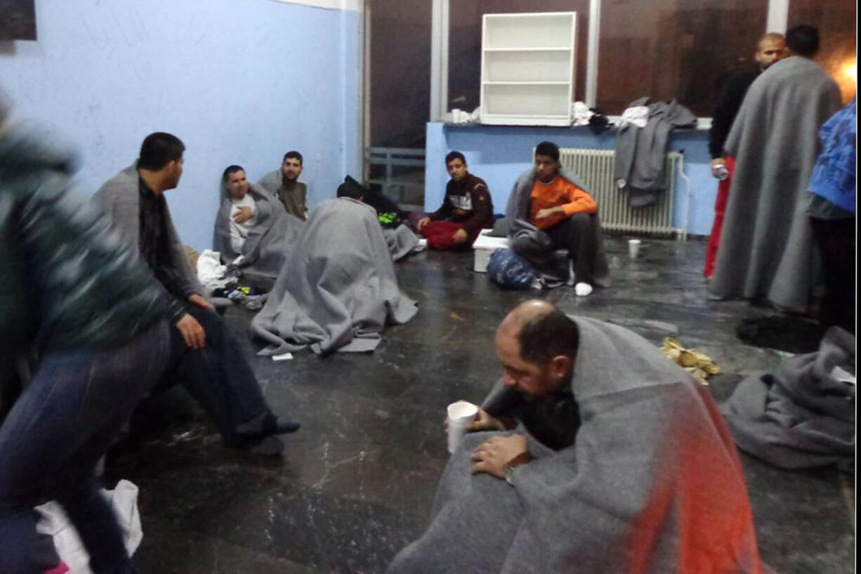 Survivors try to warm up at Kalymnos island on Friday after a rescue operation by the coast guard. A wooden sailboat carrying an undetermined number of people sank off the islet of Kalolimnos near the Greek southeastern island of Kalymnos. A number of people died in two separate incidents of boats smuggling migrants or refugees sinking off two Greek islands overnight into Friday. Dozens survived, and a search and rescue operation was underway for more potential survivors.