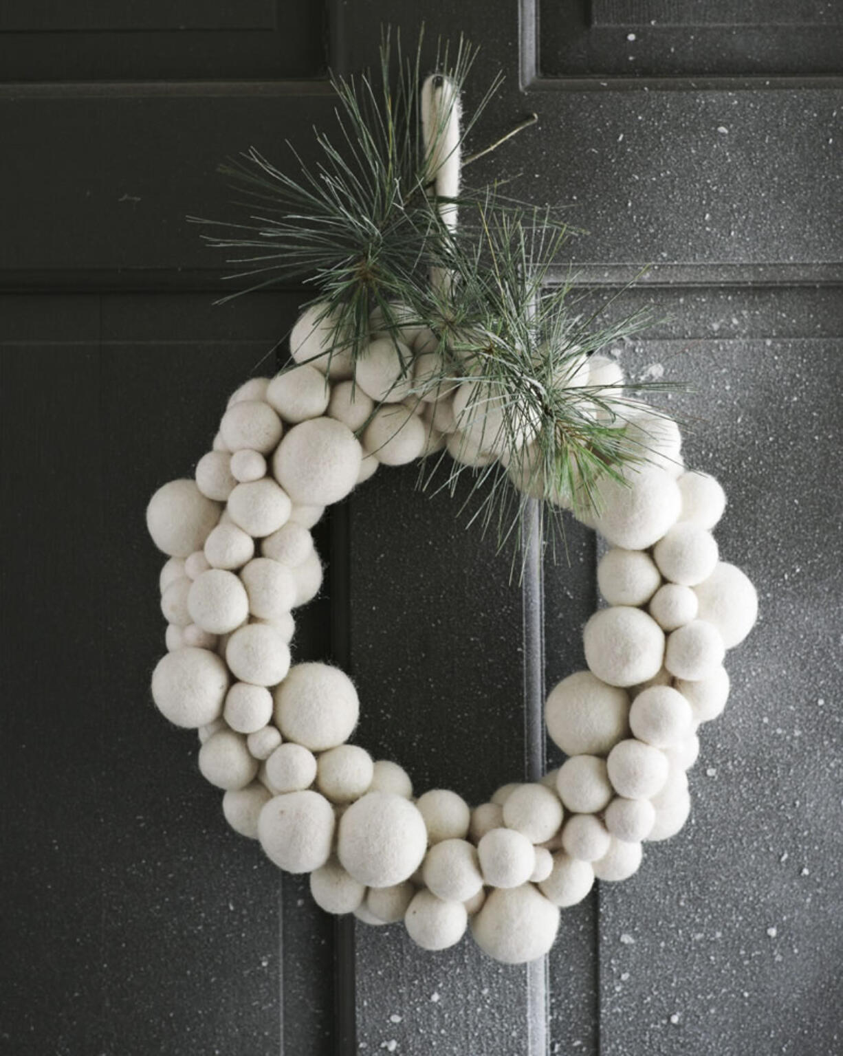 This wreath from West Elm is studded with white felt balls that look like snowballs.