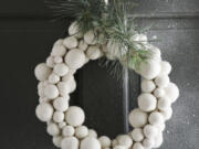 This wreath from West Elm is studded with white felt balls that look like snowballs.