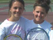 Battle Ground High School tennis doubles partners Taylor Beardall, left, and Megan Giesbers.