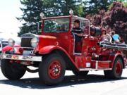 Members of Clark County Fire District 6 gave children rides in a 1940-model Halobird fire engine as part of their Saturday open house.