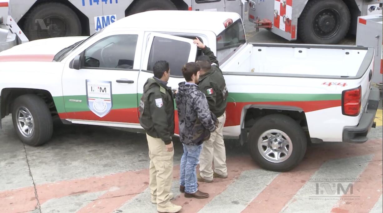 Ethan Couch is escorted Thursday by Mexican immigration agents, upon their arrival to the international airport in Mexico City. A Texas judge ruled Friday that Couch won&#039;t be moved to an adult jail as he awaits trial for allegedly violating his probation.