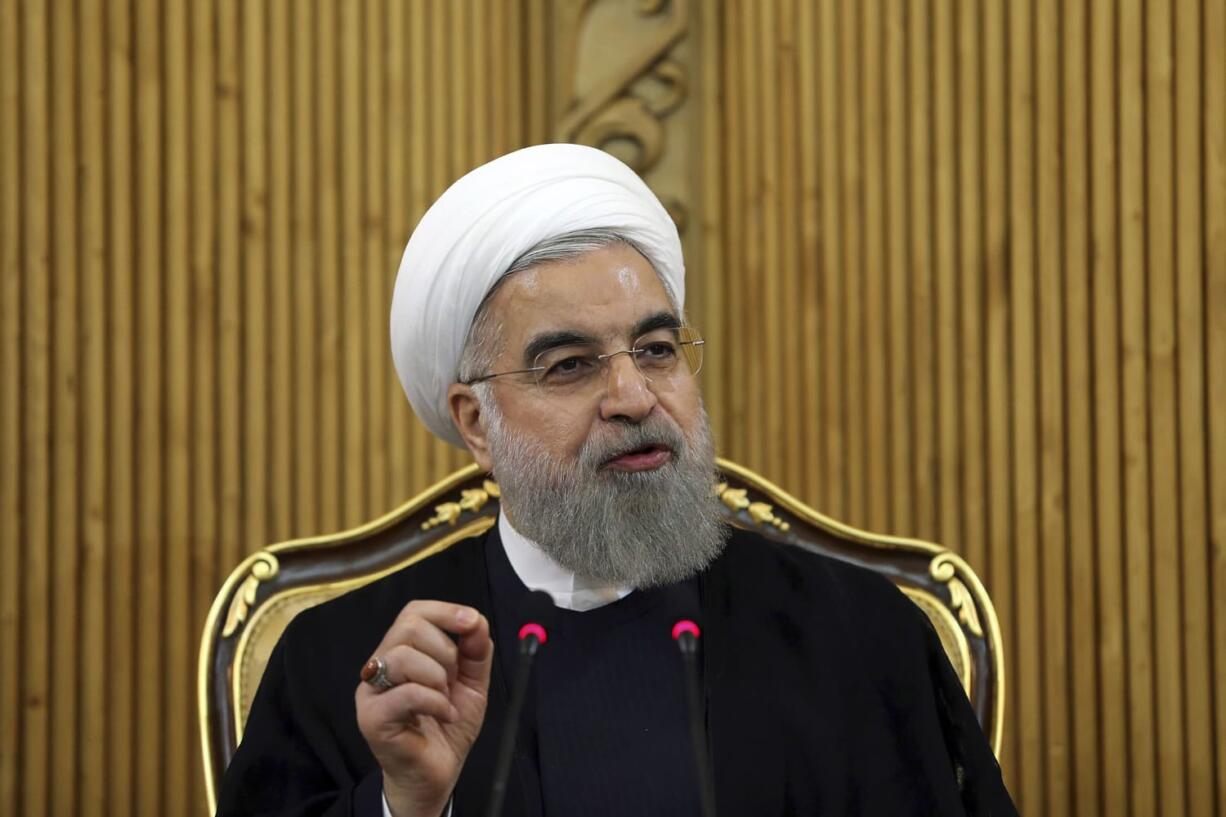 Iranian President Hassan Rouhani briefs media upon his arrival from the U.S. at Mehrabad airport in Tehran, Iran. In a statement posted to his website Tuesday, Rouhani said that Saudi Arabia ?cannot cover its crime? in executing a Shiite cleric by severing ties with the Islamic Republic, referring to the execution last week of Sheikh Nimr-al Nimr.