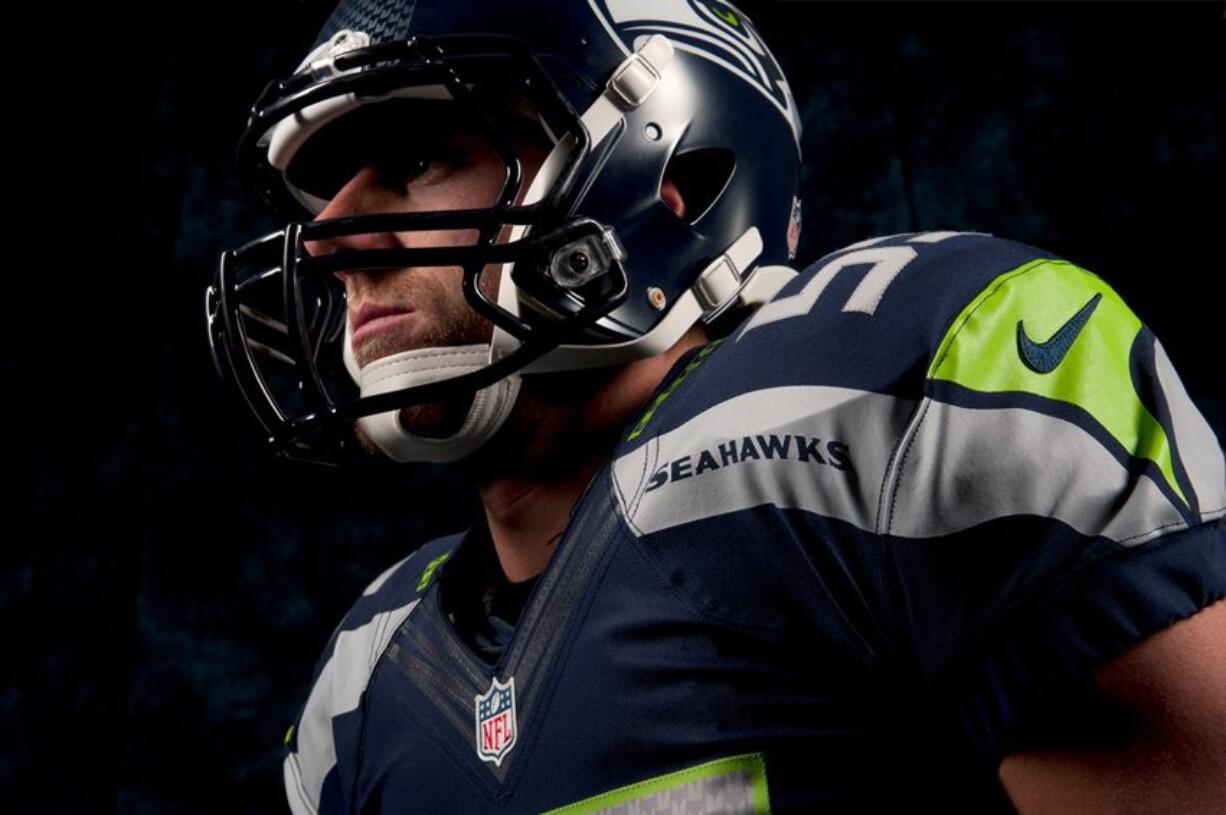 In this undated photo provided by the Seattle Seahawks, the NFL team's new uniform design is shown. The NFL unveiled new uniforms designed by Nike for all 32 teams Tuesday, April 3, 2012, at a New York fashion show.