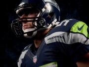 In this undated photo provided by the Seattle Seahawks, the NFL team's new uniform design is shown. The NFL unveiled new uniforms designed by Nike for all 32 teams Tuesday, April 3, 2012, at a New York fashion show.