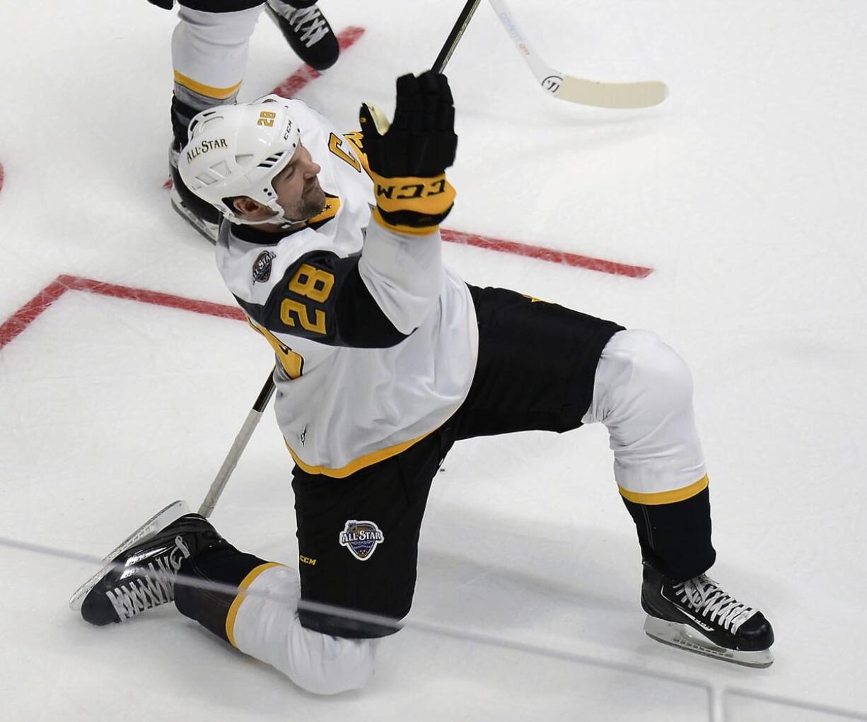 Pacific Division forward John Scott (28) celebrates after scoring a goal during an NHL hockey All-Star semifinal round game against the Central Division team Sunday, Jan. 31, 2016, in Nashville, Tenn.