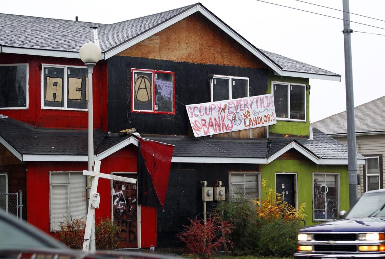 A formerly boarded-up duplex that protesters have taken over in Seattle's Central District is seen.