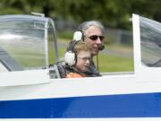 Daniel Conway, 8, from Vancouver, and pilot Gus Funnell taxi to the runway for a free ride at a past Pearson Air Museum's Open Cockpit Day.