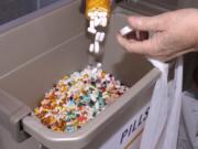 Area residents dispose of unneeded medications at the drug take-back event.