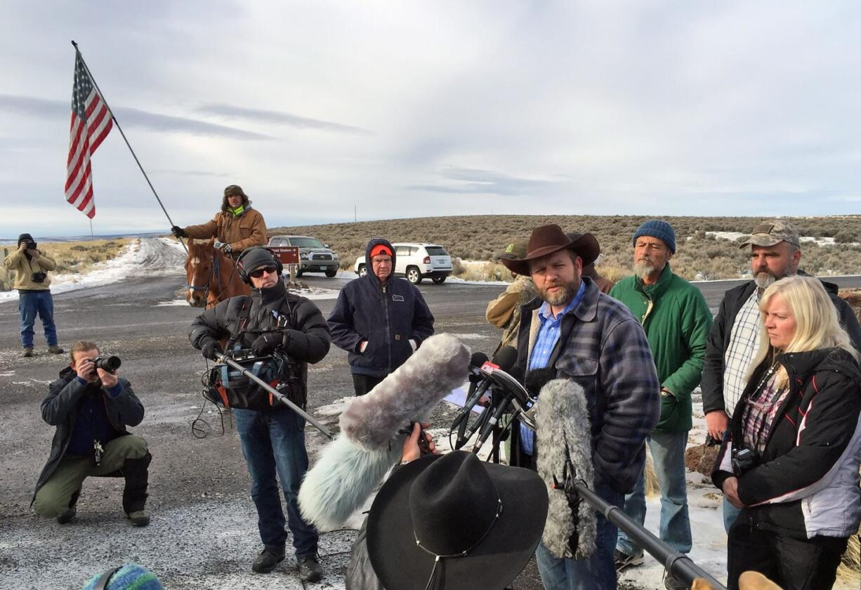 Ammon Bundy speaks to reporters Thursday at the Malheur National Wildlife Refuge in Burns, Ore. Bundy is the leader of a small, armed group that has been occupying the remote refuge in Oregon since Jan. 2 to protest federal land policies.