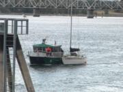 A Multnomah County Sheriff's Office boat towed a sailboat to the Quay after it got stuck in the railway bridge over the Columbia River Wednesday morning.