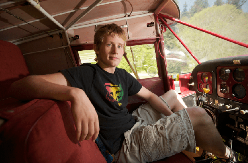 La Center High School senior Justin Kempf in his father's 1946 Commonwealth Sky Ranger 185.