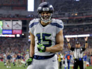 Seattle Seahawks wide receiver Jermaine Kearse (15) celebrates his touchdown against the Arizona Cardinals during the first half of an NFL football game, Sunday, Jan. 3, 2016, in Glendale, Ariz. (AP Photo/Ross D.