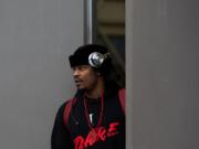 Marshawn Lynch leaves the team training center to board a bus to the airport for Sunday&#039;s game in Carolina.