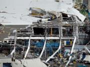 Damage is evident Sunday at Boeing and Spirit AeroSystems in Wichita, Kan., after a tornado swept through the area late Saturday.