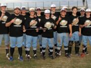 Showtime Baseball College Prep holds the champions' bat after winning the Southwest Wood Bat Classics MLK Showcase Tournament on Jan. 18 in Phoenix, Ariz.