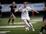 Skyview's Sheaffer Skadsen moves the ball up field against Battle Ground at Kiggins Bowl on Thursday September 8, 2011.