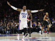 Philadelphia 76ers&#039; Robert Covington reacts to his 3-point shot during the first half of an NBA basketball game against the Portland Trail Blazers, Saturday, Jan. 16, 2016, in Philadelphia.