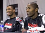 Free agents Jamal Crawford, right, and Craig Smith, who signed with the Portland Trail Blazers, appear at a news conference in Portland on Friday.