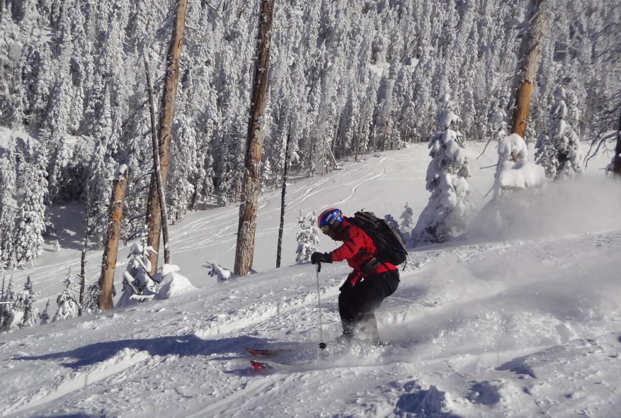 A skier makes their way down a hill at the resort near Flagstaff, Ariz. It&#039;s one of a few downhill ski areas in Arizona, which is better known for deserts, golf and the Grand Canyon than for snowy winter activities.