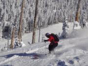 A skier makes their way down a hill at the resort near Flagstaff, Ariz. It&#039;s one of a few downhill ski areas in Arizona, which is better known for deserts, golf and the Grand Canyon than for snowy winter activities.