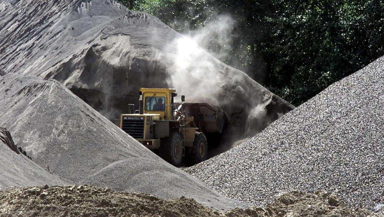 A loader works at J.E.