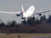 A new Japan Airlines Boeing 787 takes off Monday, March 26, from Paine Field in Everett. The plane was the first 787 delivered to JAL.